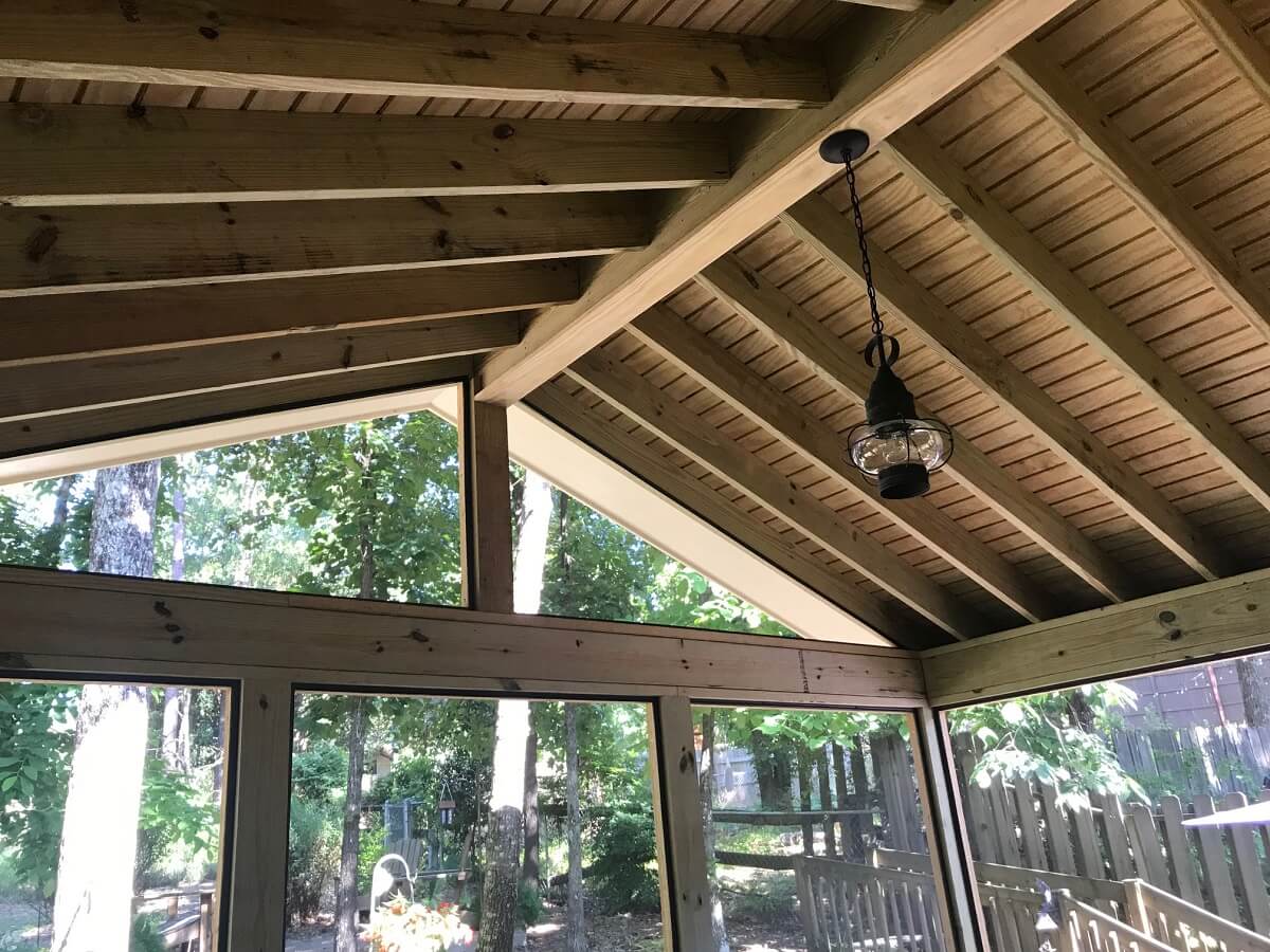 Screened porch ceiling details with hanging lighting