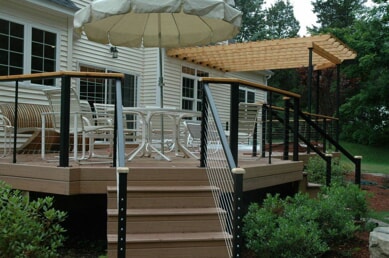 Cheshire, CT, low maintenance deck with sleek cable rail and wooden pergola