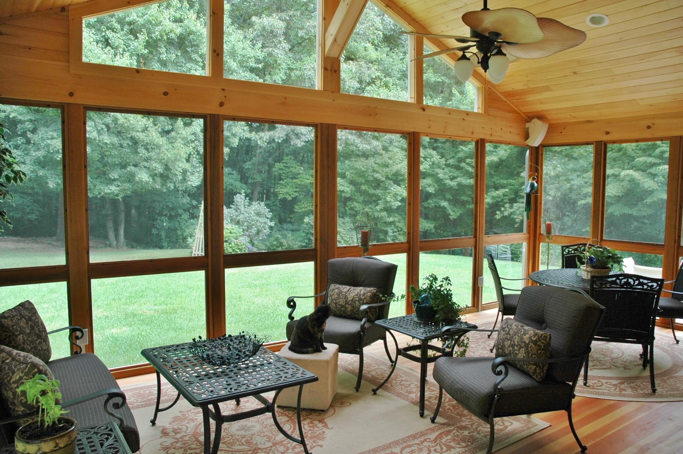 Cozy three season porch with backyard view