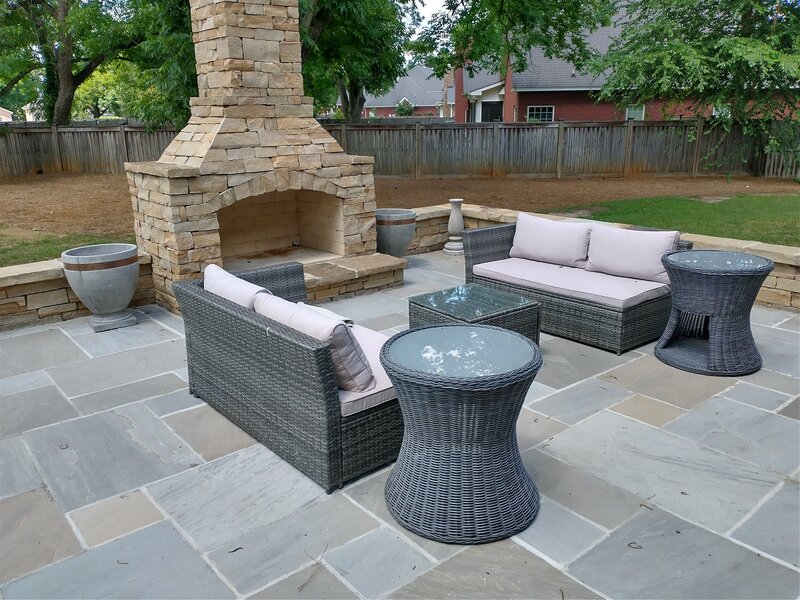 Outdoor patio with fire feature and furniture