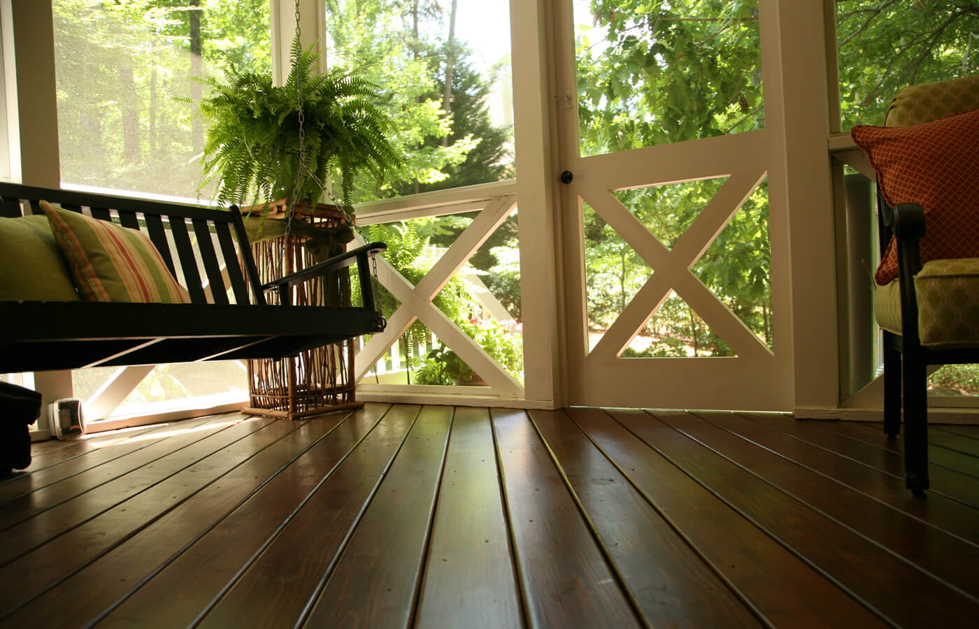 Porch with stained wood floor