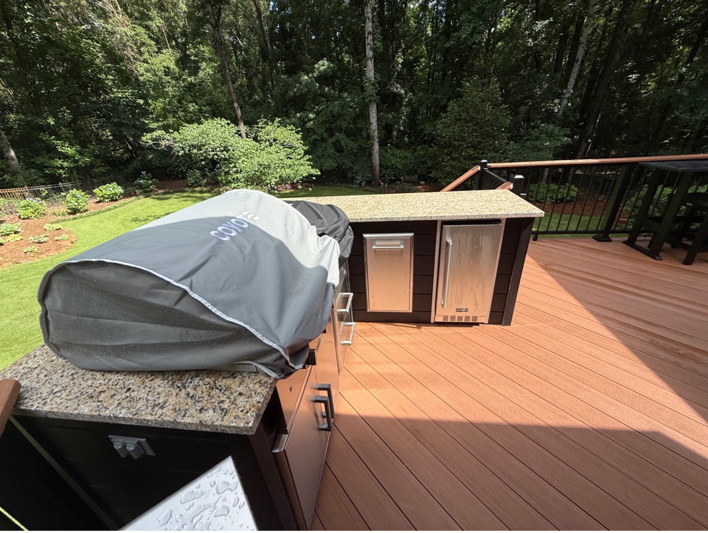 decks with integrated outdoor kitchens and grilling areas