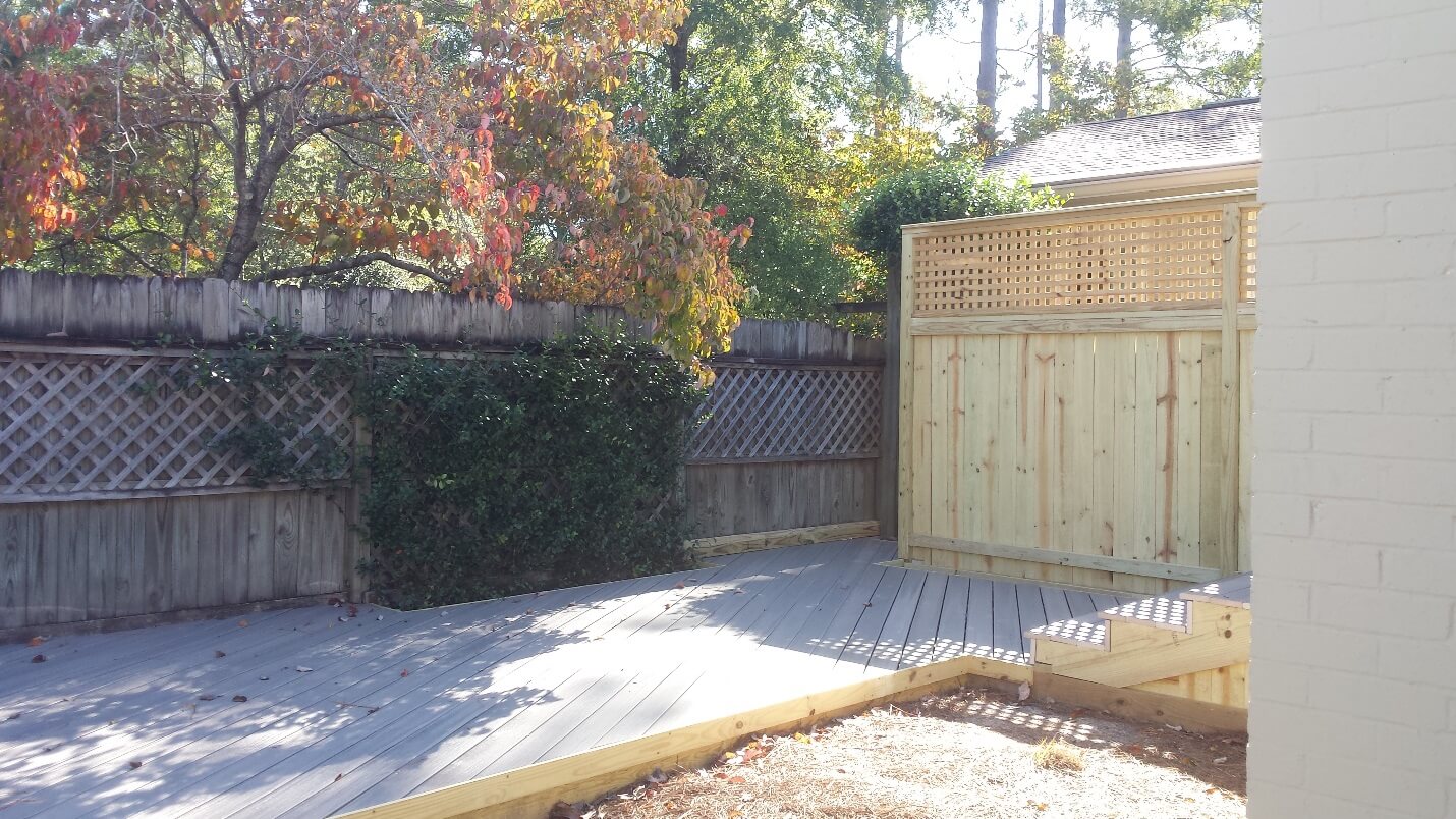 Custom low maintenance wood deck and privacy wall