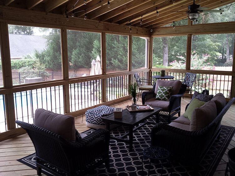 Cozy screened porch overlooking swimming pool