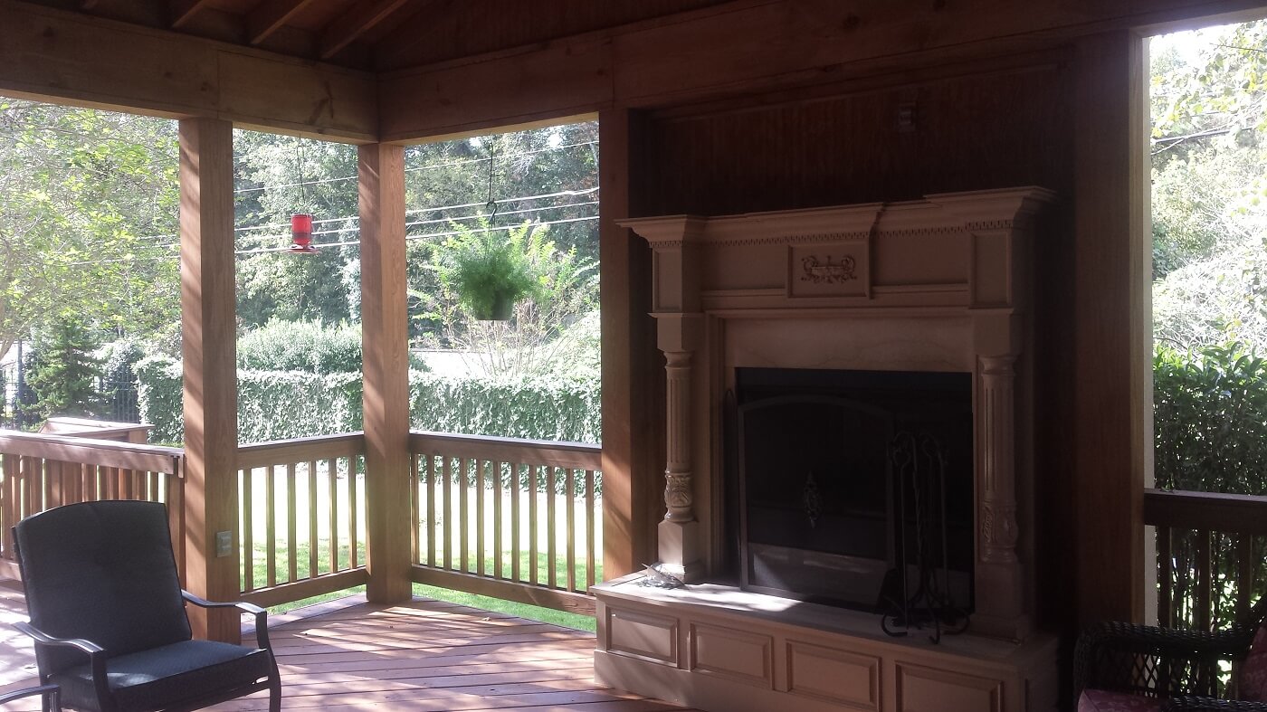Covered porch with custom outdoor fireplace