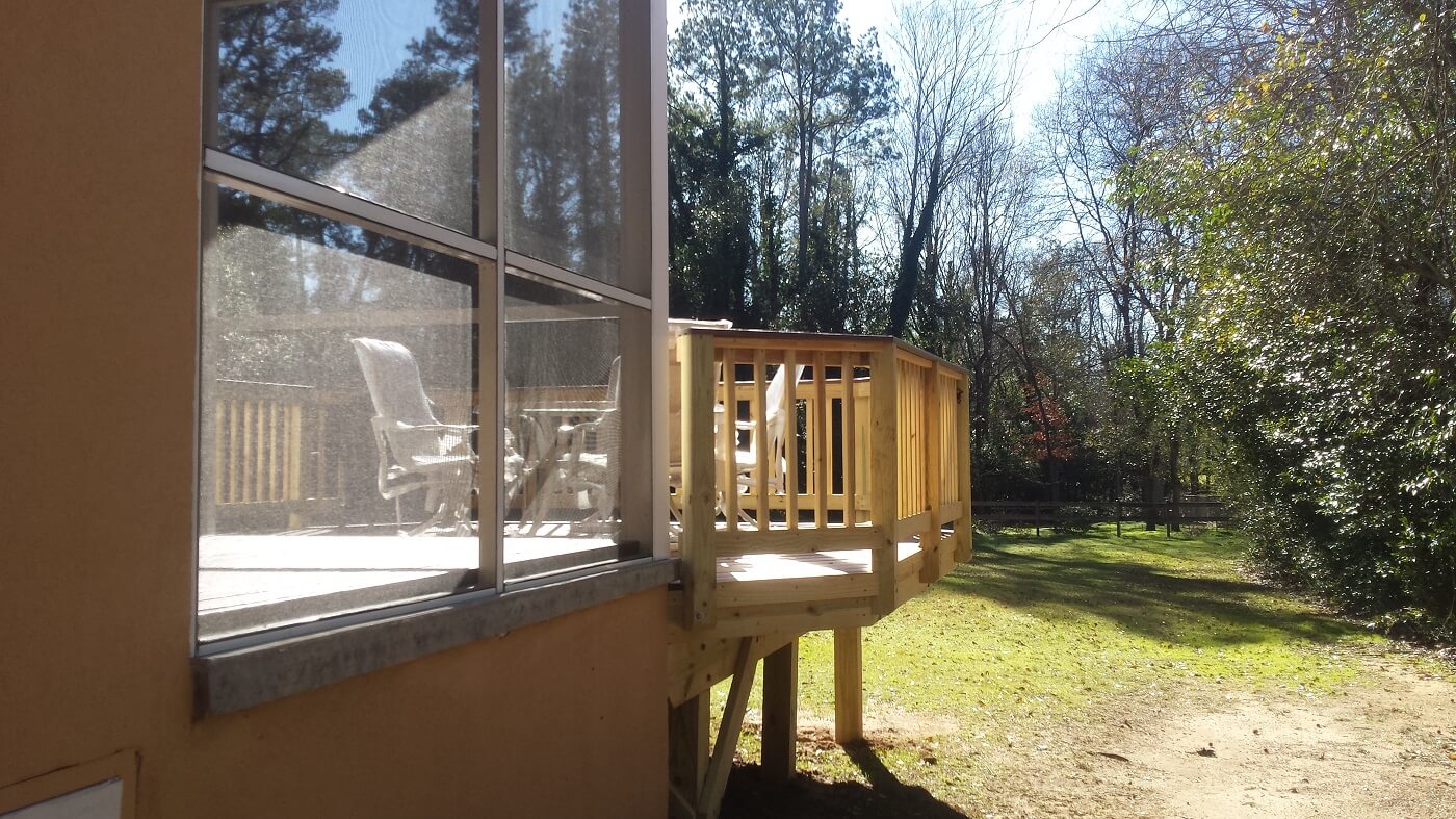 Side view of new deck and screened porch