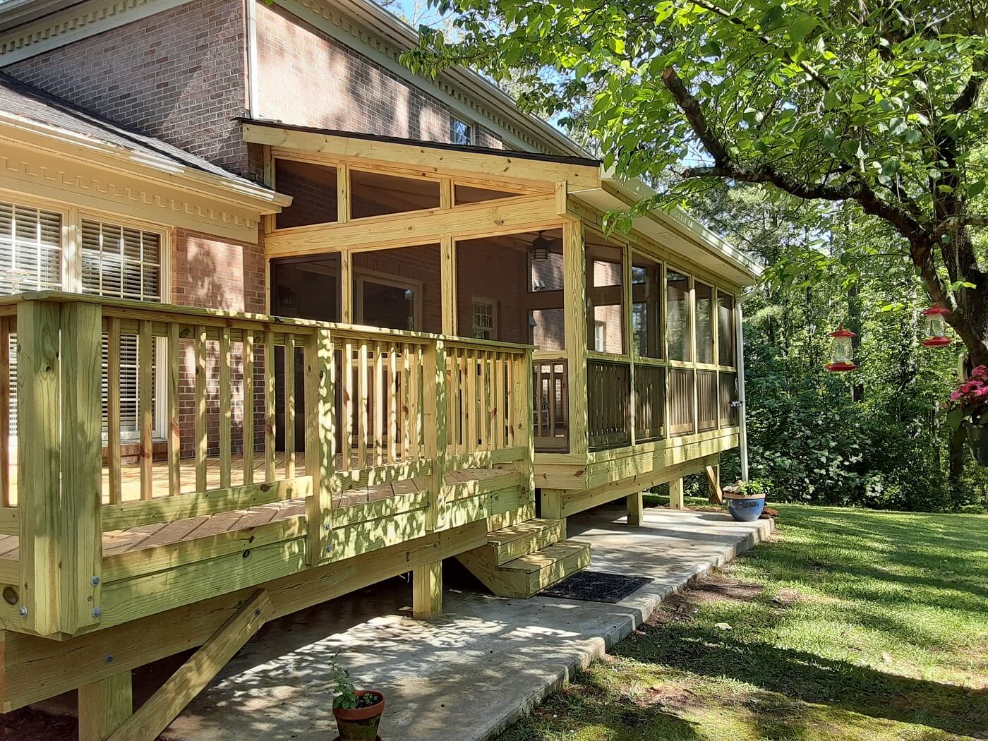 Closer view of screened porch and deck