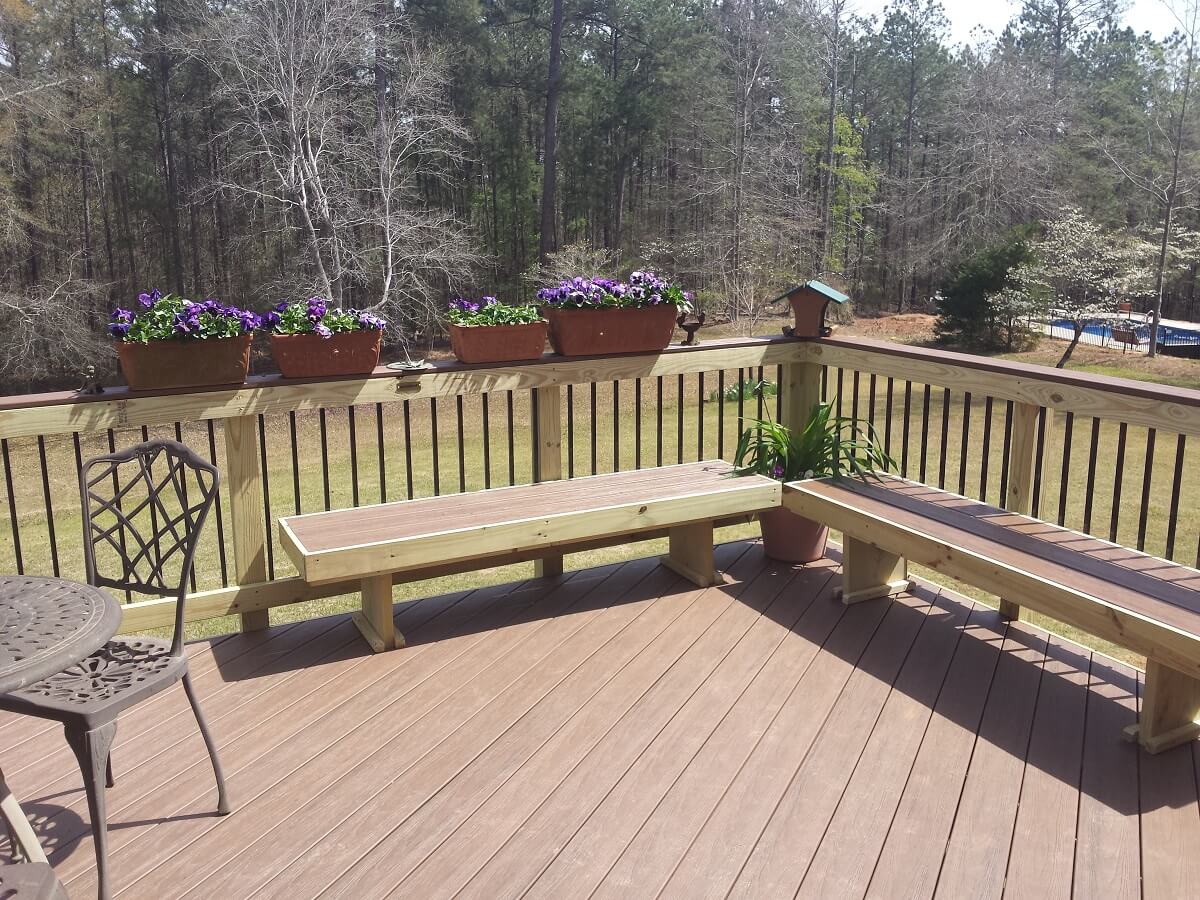 Custom deck with planter boxes and floating benches