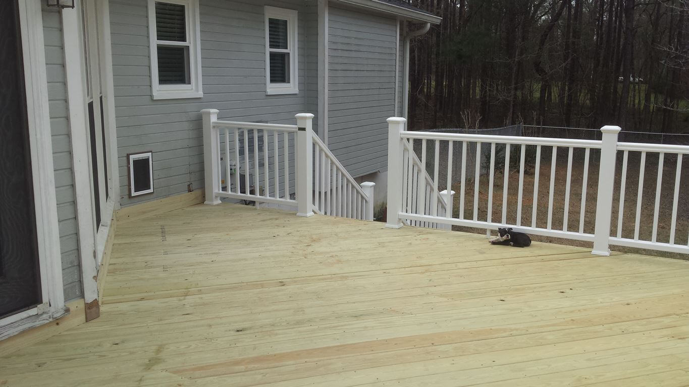 New custom deck with white railing