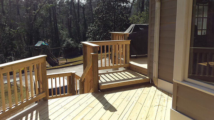 Custom wood deck with balusters