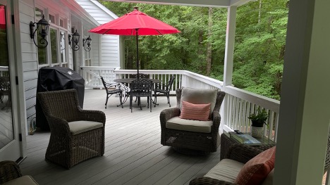 deck with red umbrella