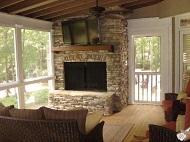 enclosed porch with built in fireplace