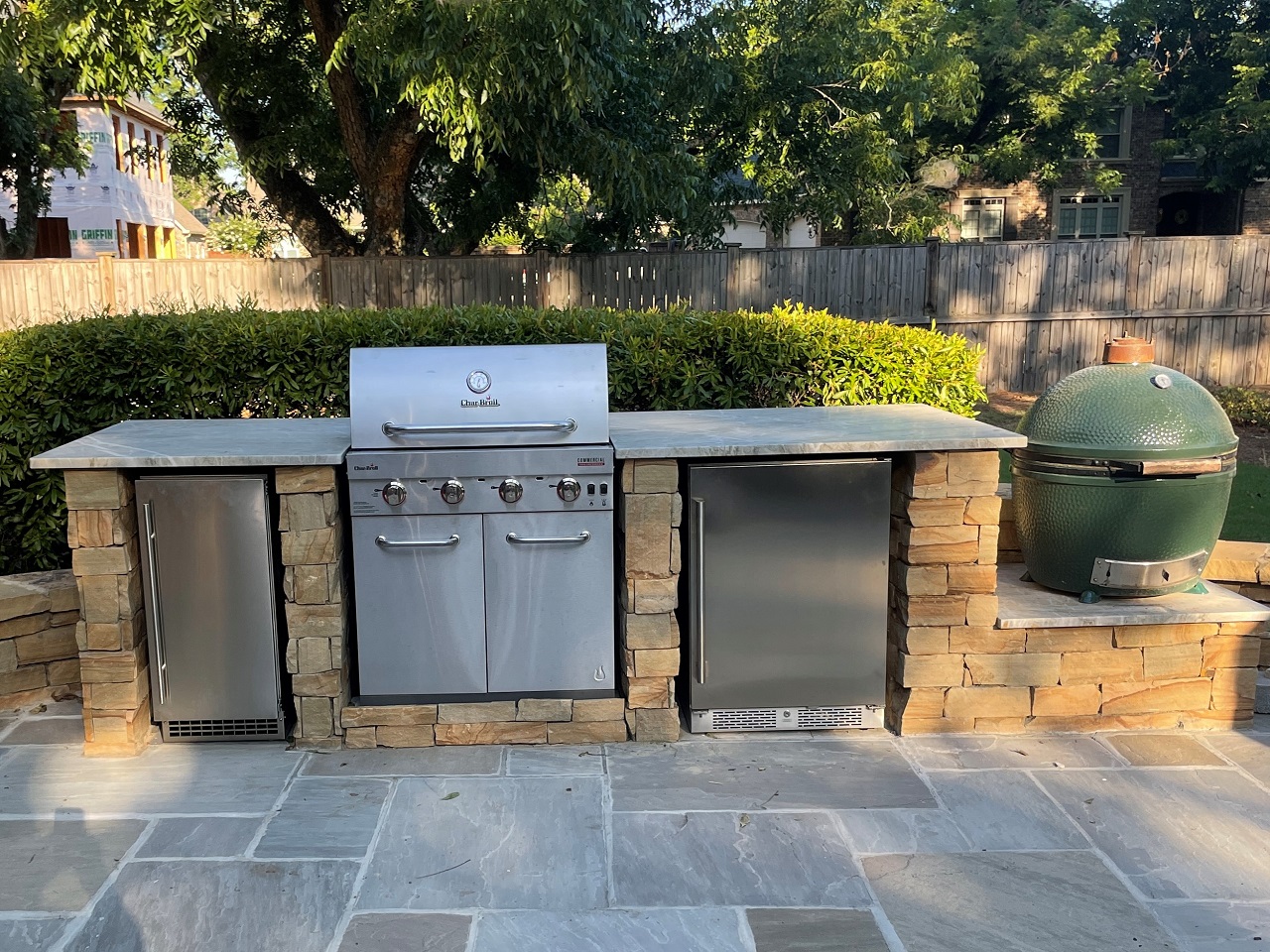 outdoor rock kitchen with grills