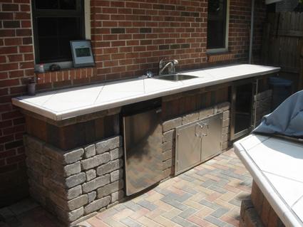 Outdoor kitchen bar and cooking area