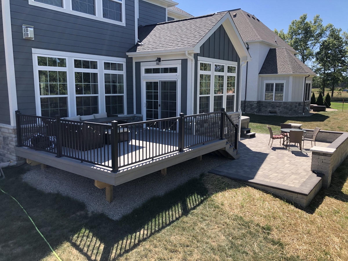 Consider the benefits of a deck and patio combination! 