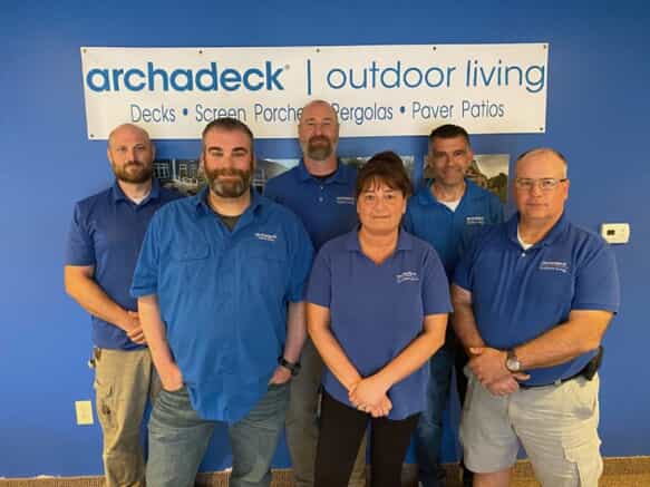Archadeck of Columbus staff in matching blue shirts