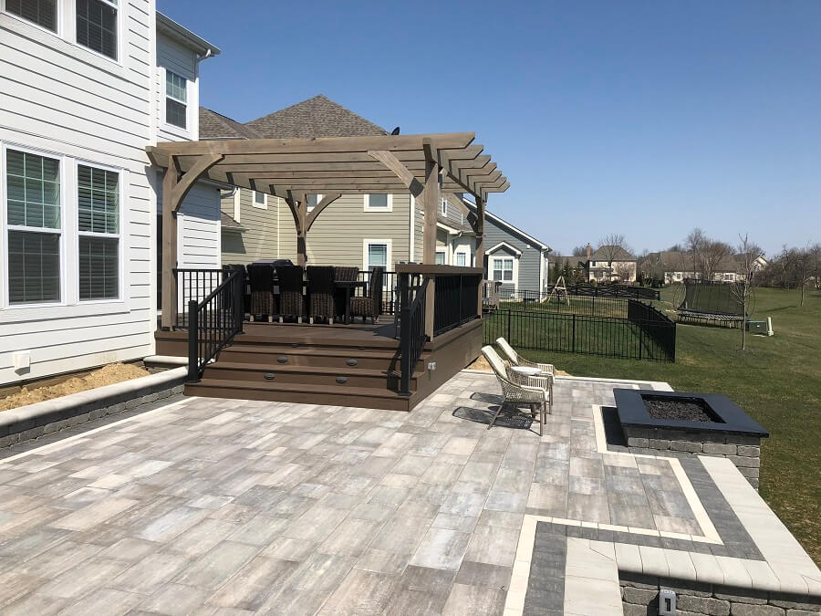 Custom patio and deck with pergola and fire pit