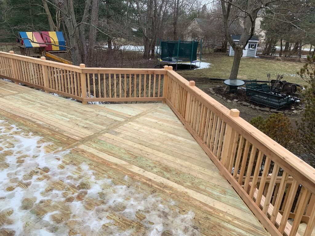 Wood deck with snow