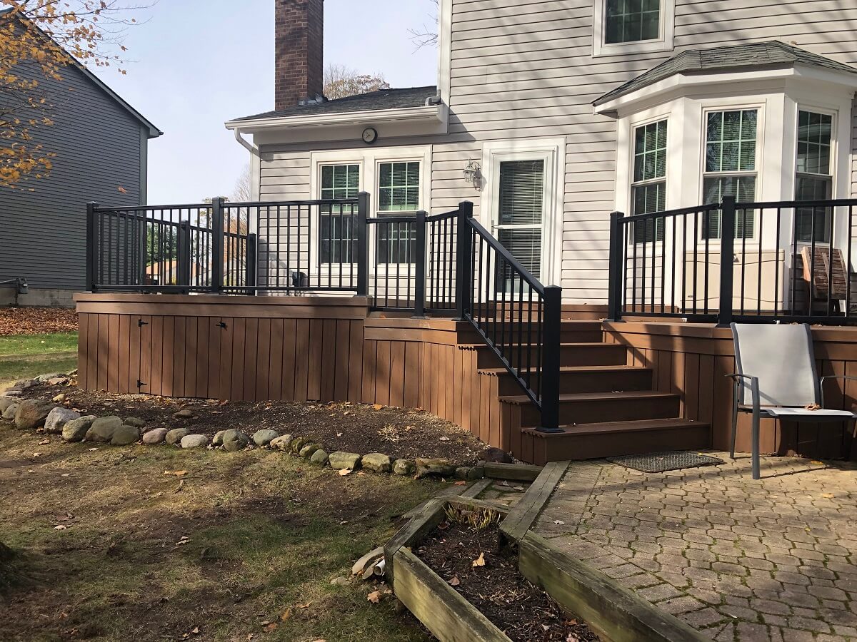 Custom backyard deck with railing 