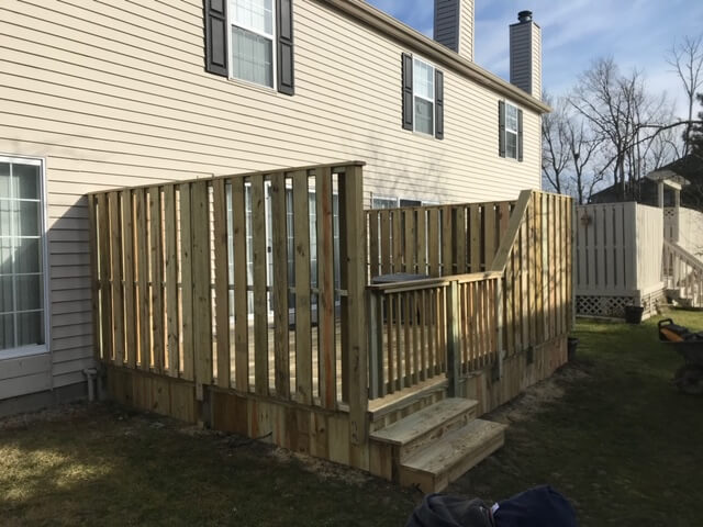 Custom wood deck with privacy wall
