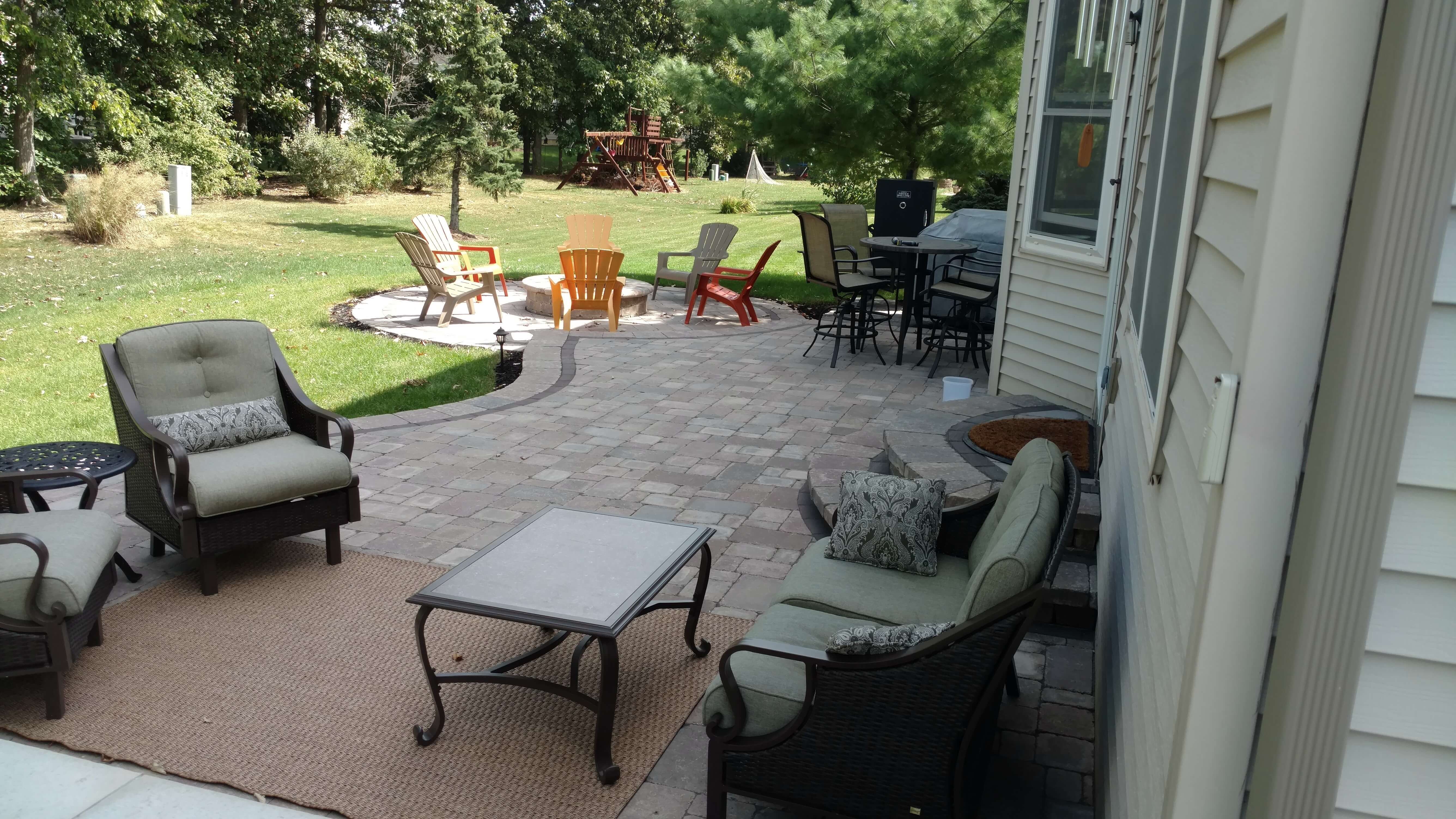 Custom backyard patio with fire pit