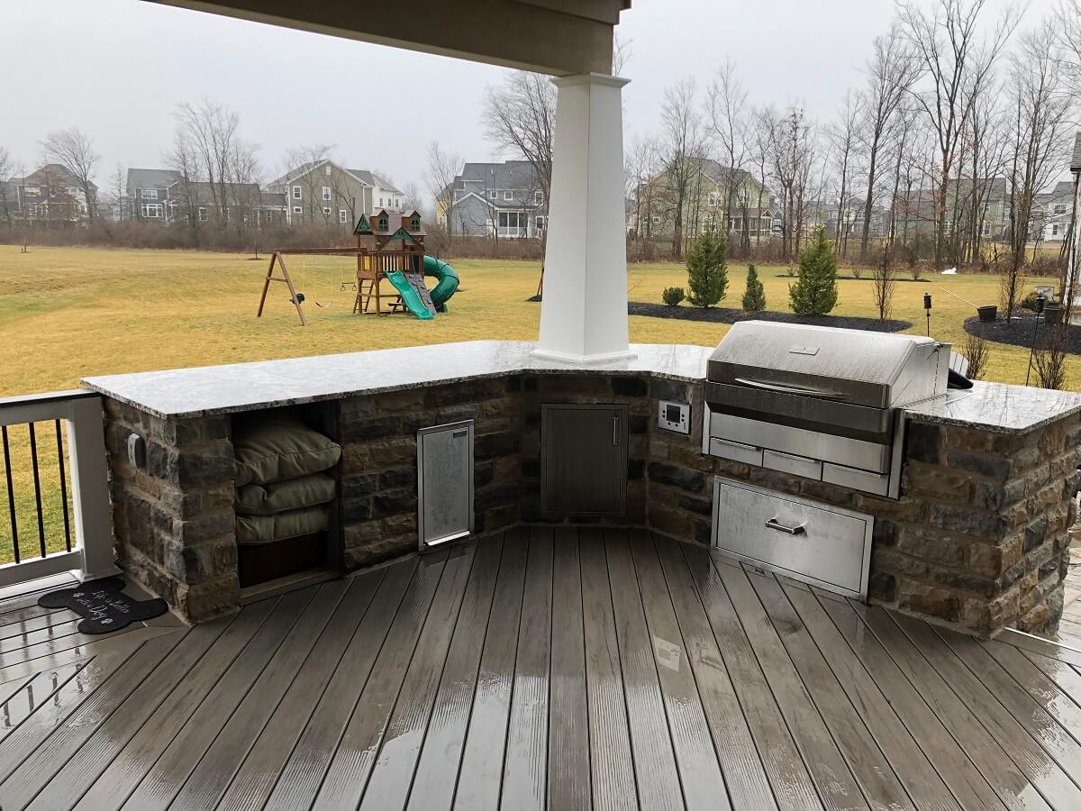 Outdoor kitchen on covered porch