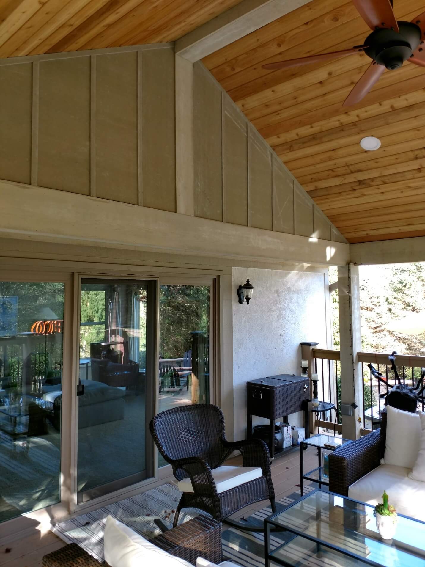 Covered porch seating area and sliding door