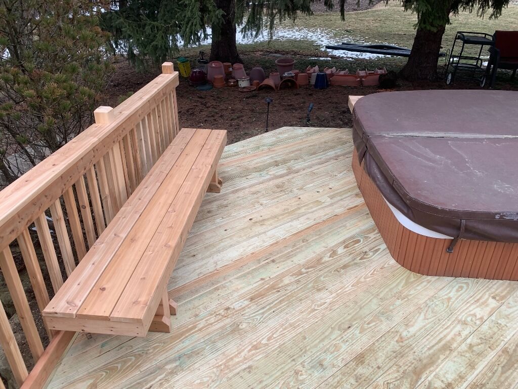 Custom hot tub wood deck with floating bench