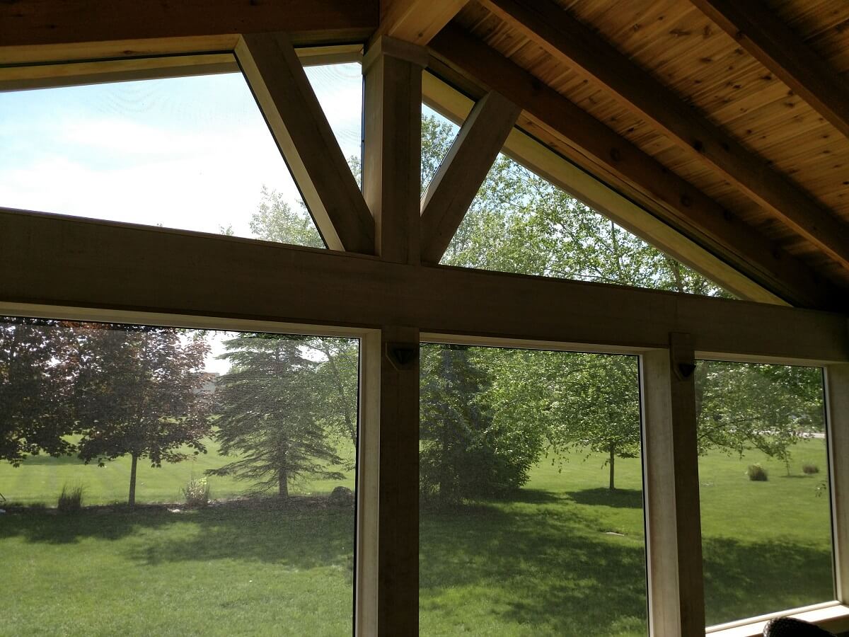 Backyard view from inside of screened porch