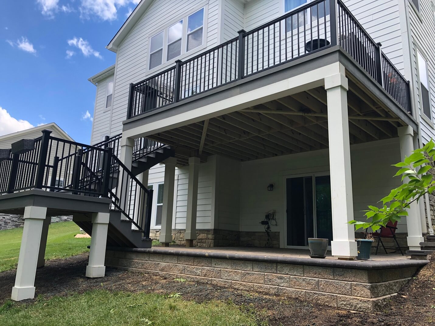 Custom elevated deck with railing and staircase