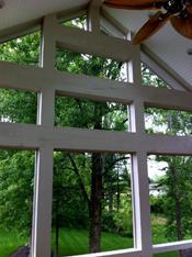 screened porch with lots of natural light 