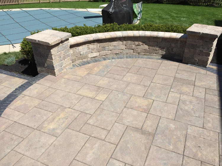 Paver patio with seating wall.