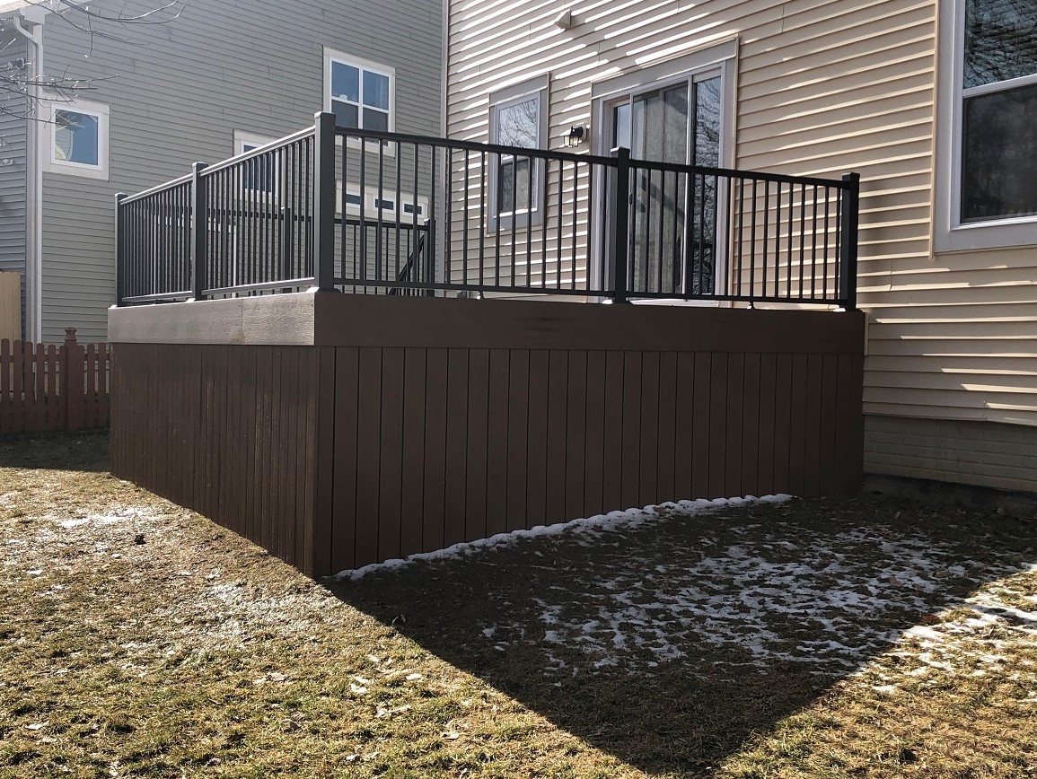 custom brown deck with snow on the ground