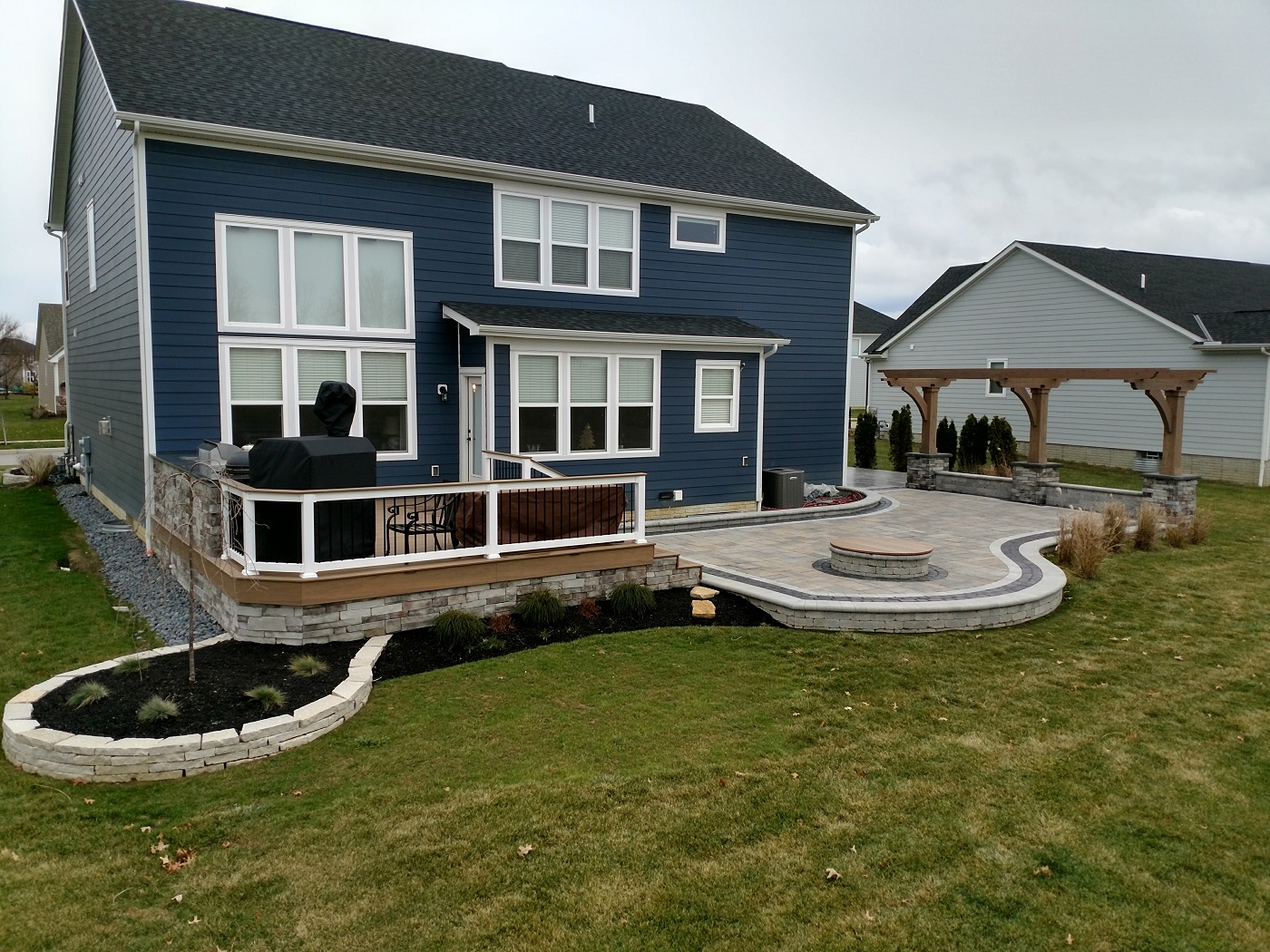 Consider the benefits of a deck and patio combination! 