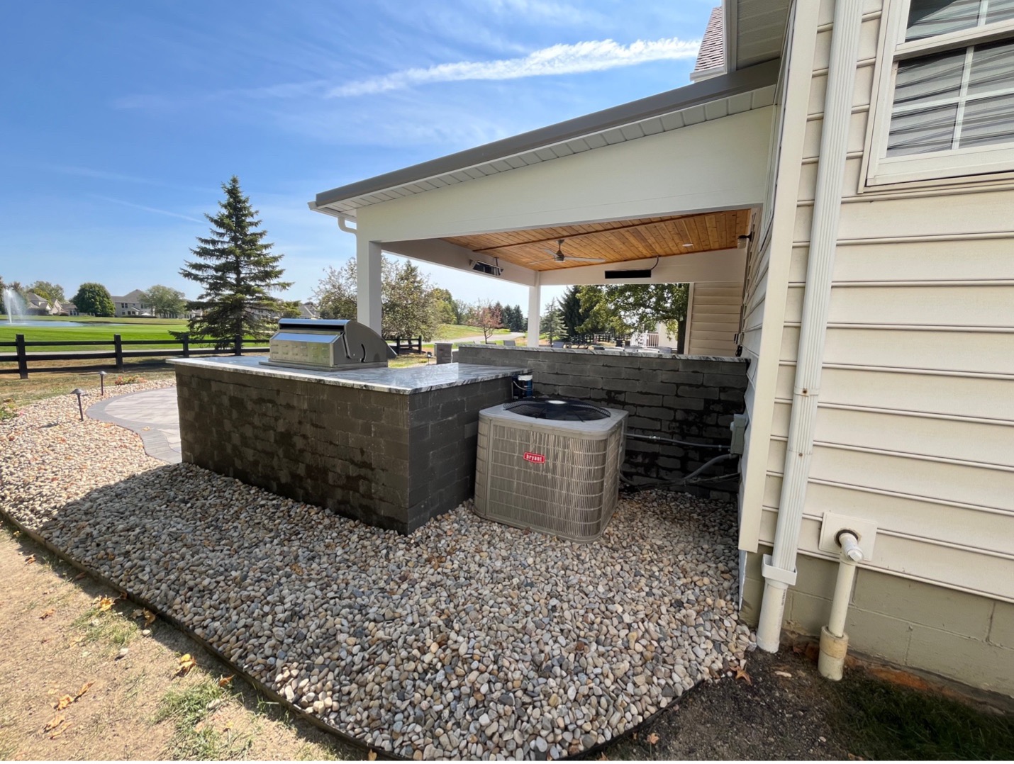 side view showing outdoor kitchen