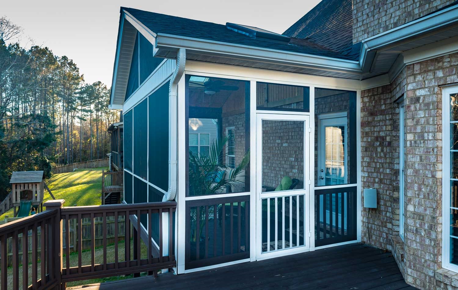 Versatile screened porch and deck combination.