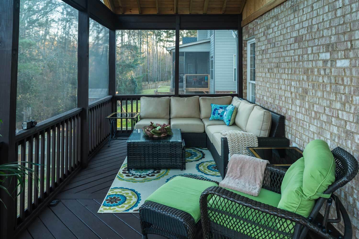 Seating area in screened in porch 