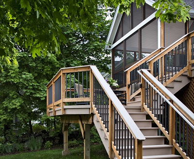 Steps to a deck and screened porch
