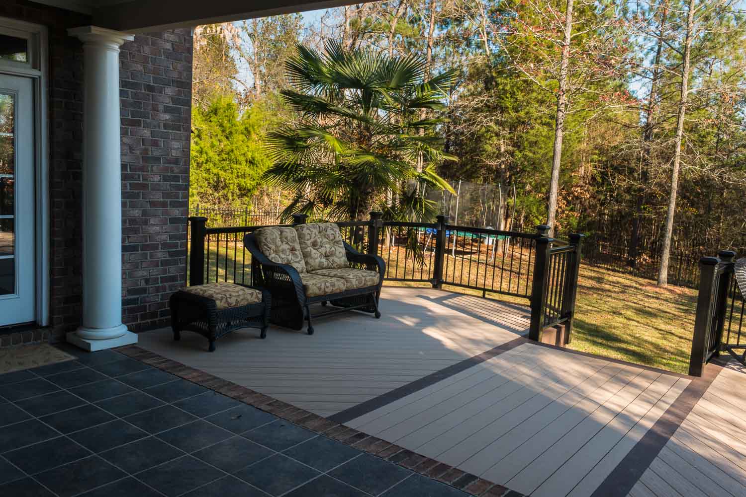 shaded deck on wooded lot