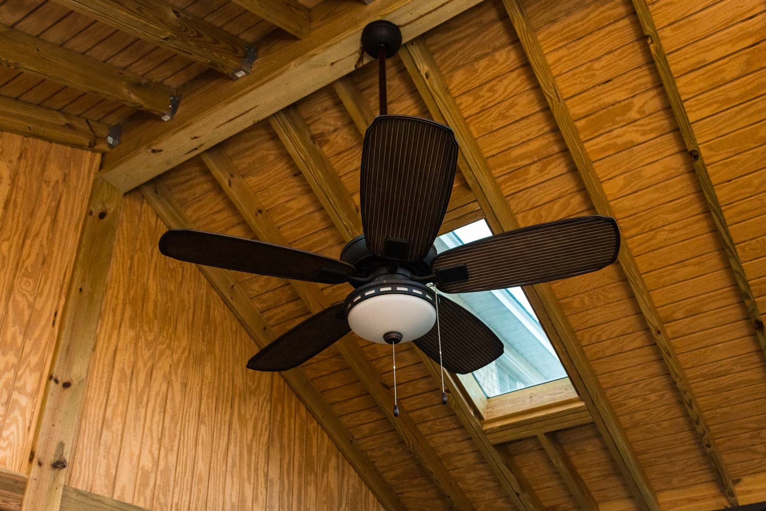 Wood ceiling with fan