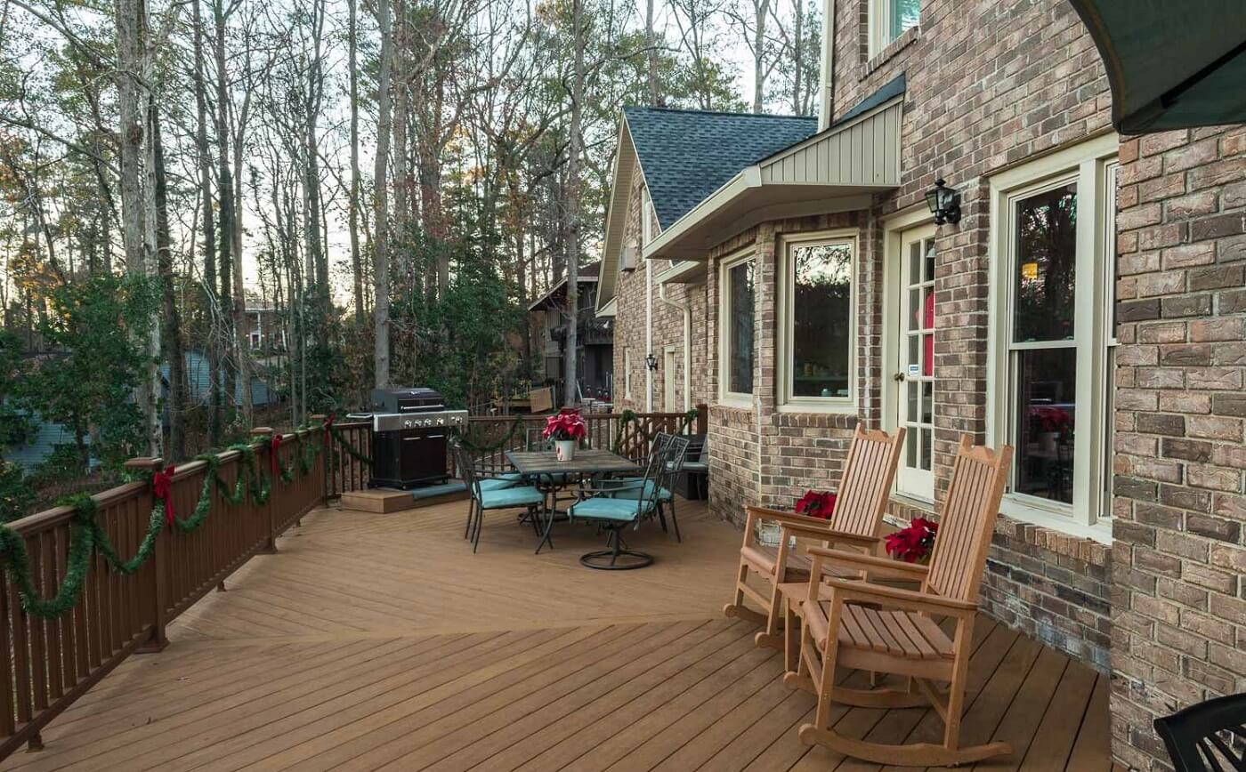 Backyard wood deck with outdoor kitchen and Christmas decors