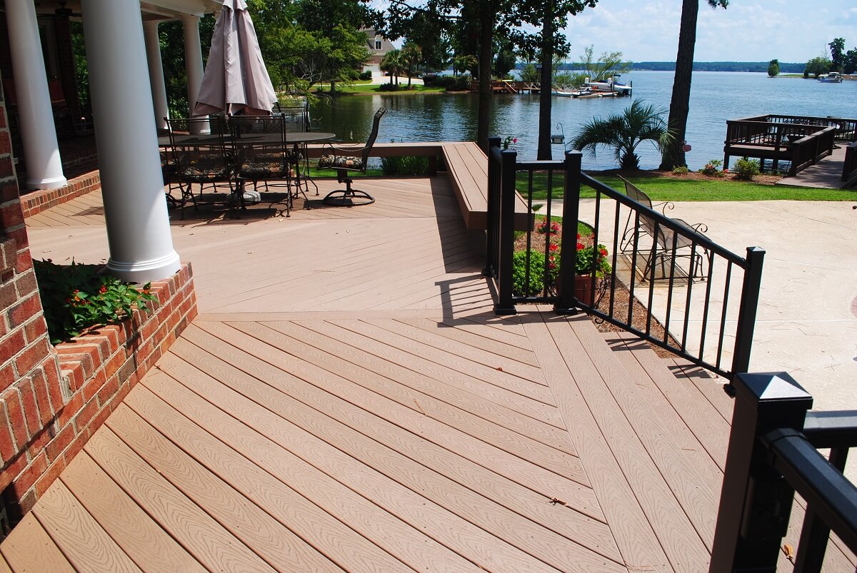 Custom deck with seating area overlooking lake