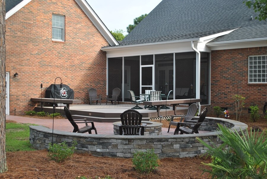 Deck and patio with outdoor kitchen and fire pit