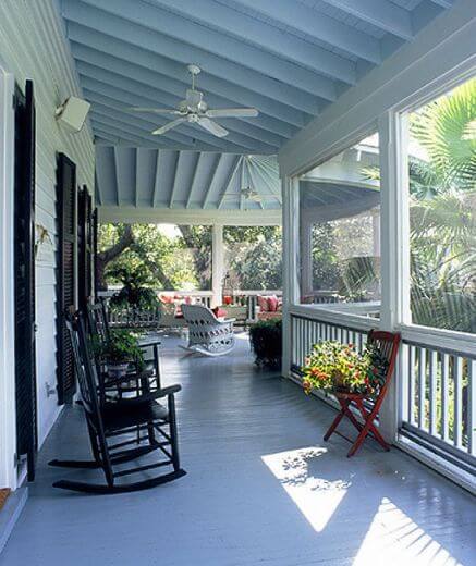 Beautiful porch with blue ceiling.