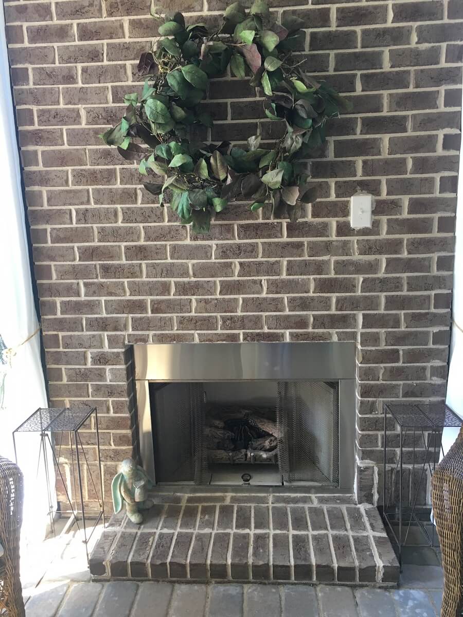 Custom fireplace on screened porch