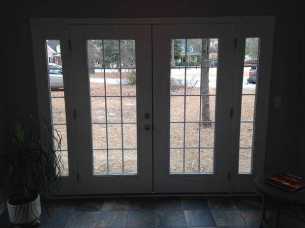 View into landscape through Columbia SC entry sunroom