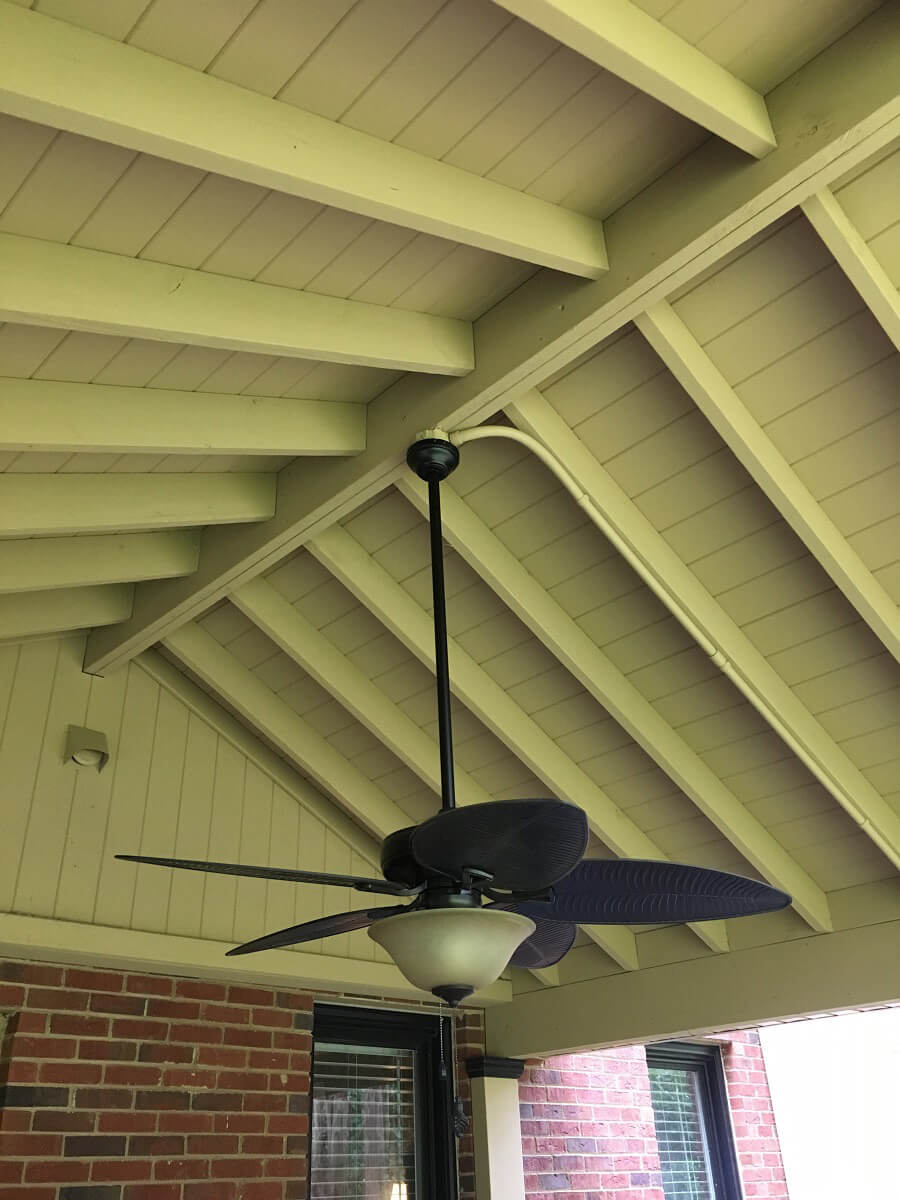 Porch wood ceiling with fan