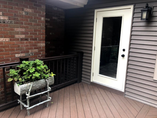 Sunroom and deck with planter box