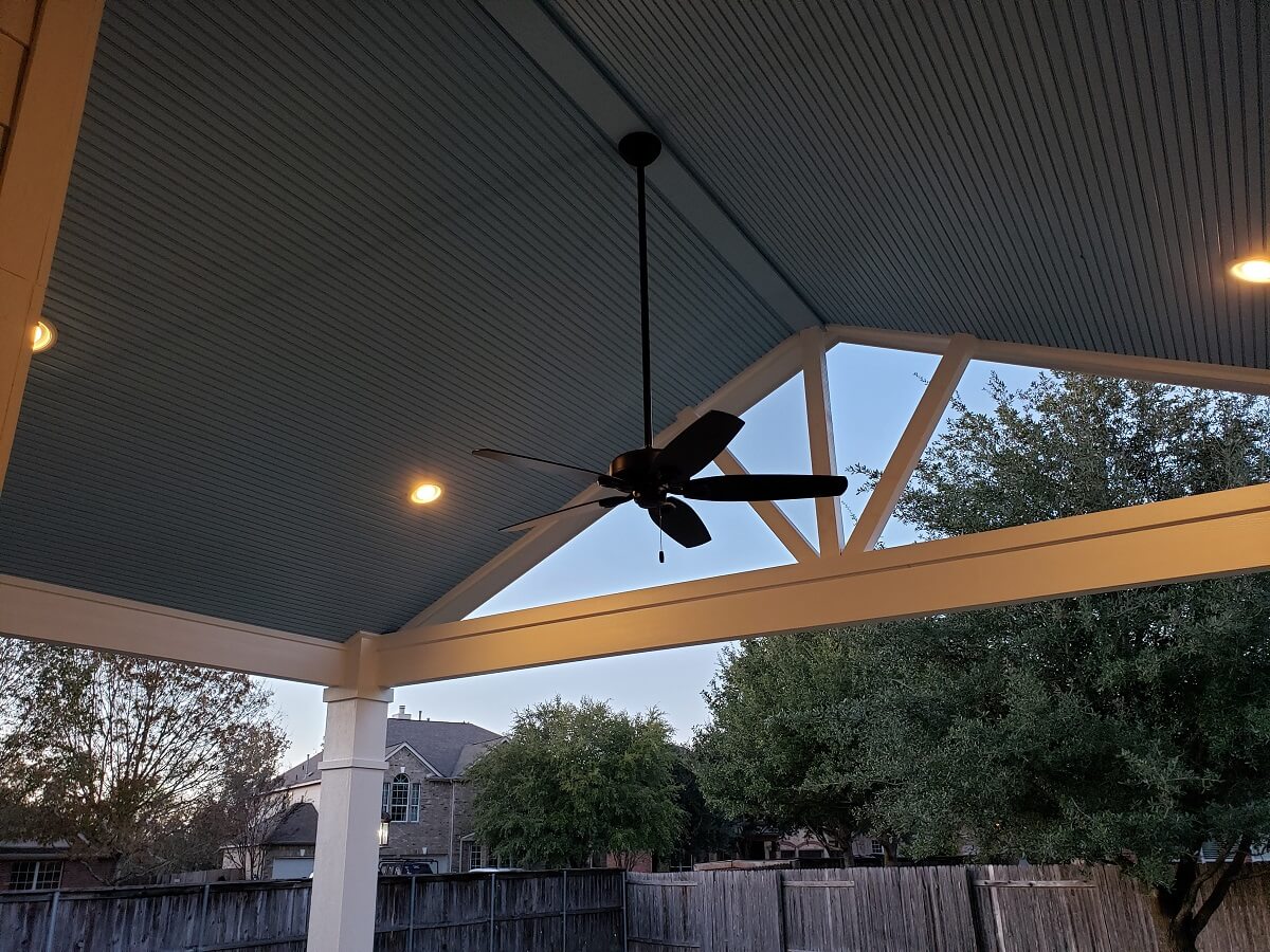 Porch blue ceiling with fan and lighting