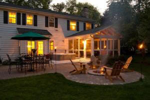 Screened Porch, Spa and Fire Pit at Dusk